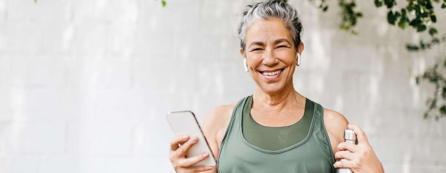 Settle into comfort at Serenity Towers at Brockton a woman holding a phone