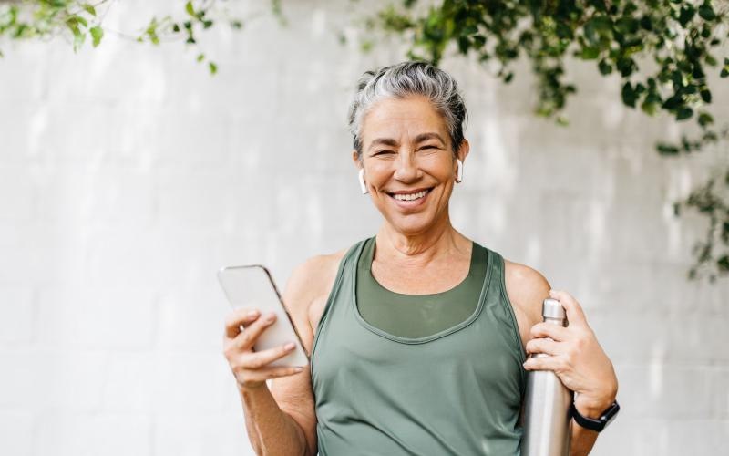 Settle into comfort at Serenity Towers at Brockton a woman holding a phone